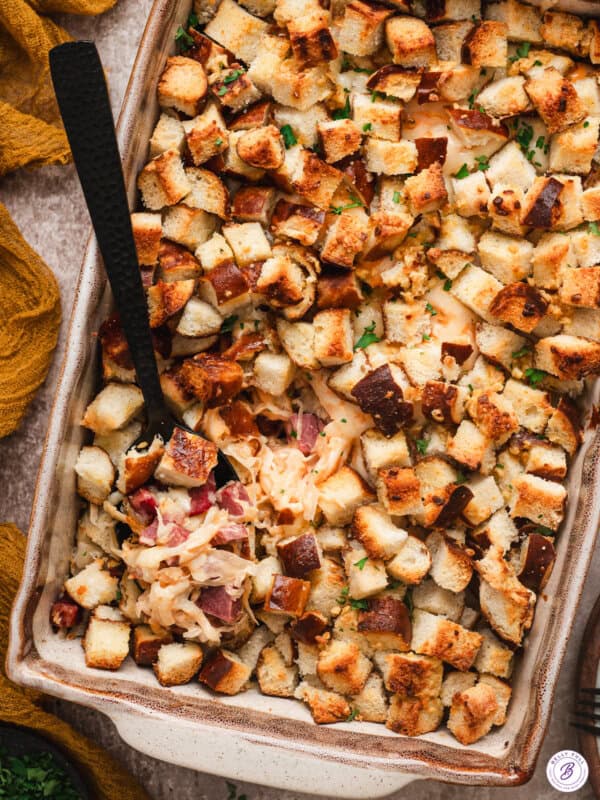 Overhead view of a finished reuben bake casserole with a spoon.