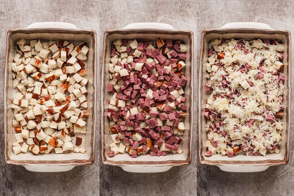 Thousand island dressing, cheese and pretzel cubes layered in a baking dish.