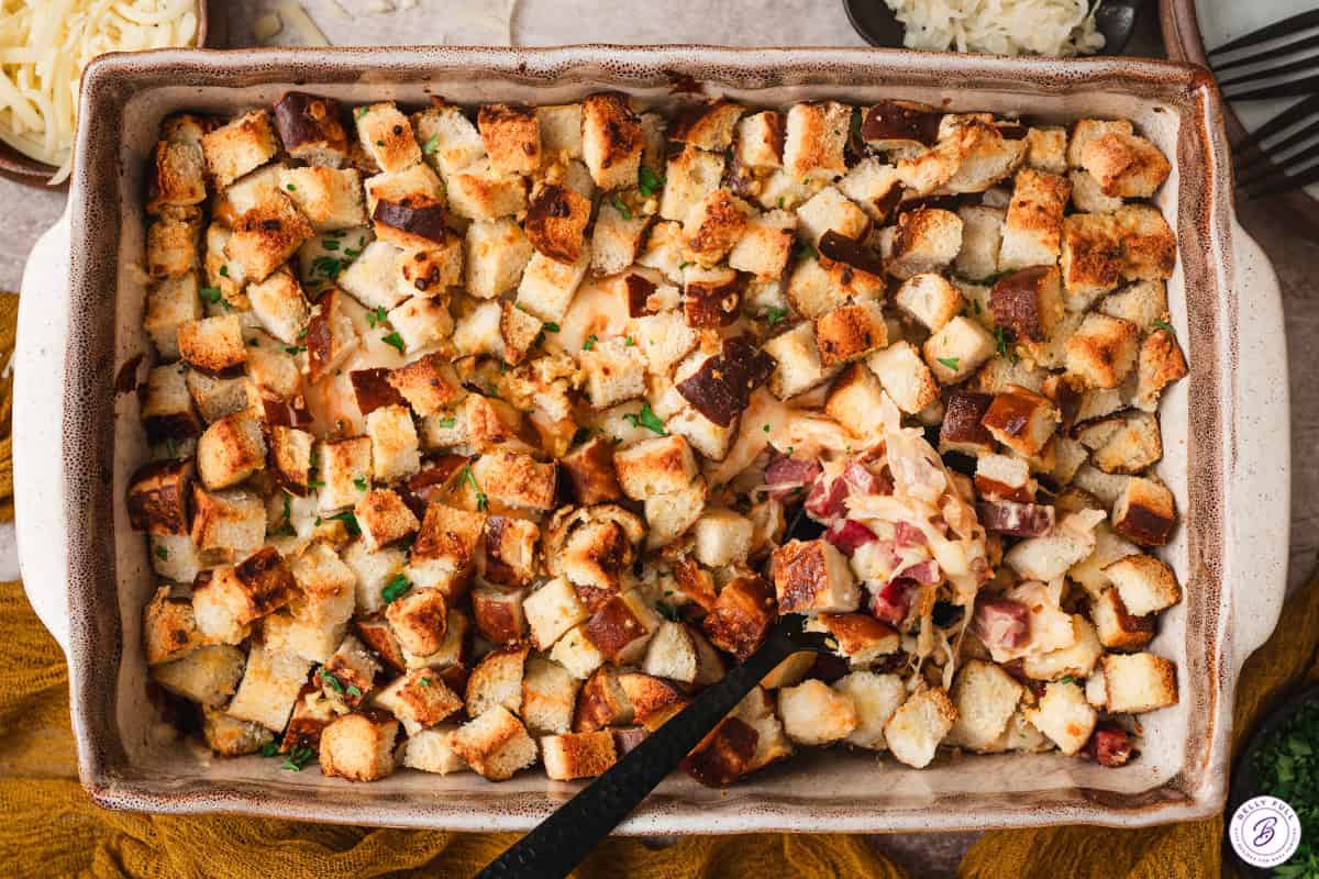 Finished reuben bake casserole with a spoon.