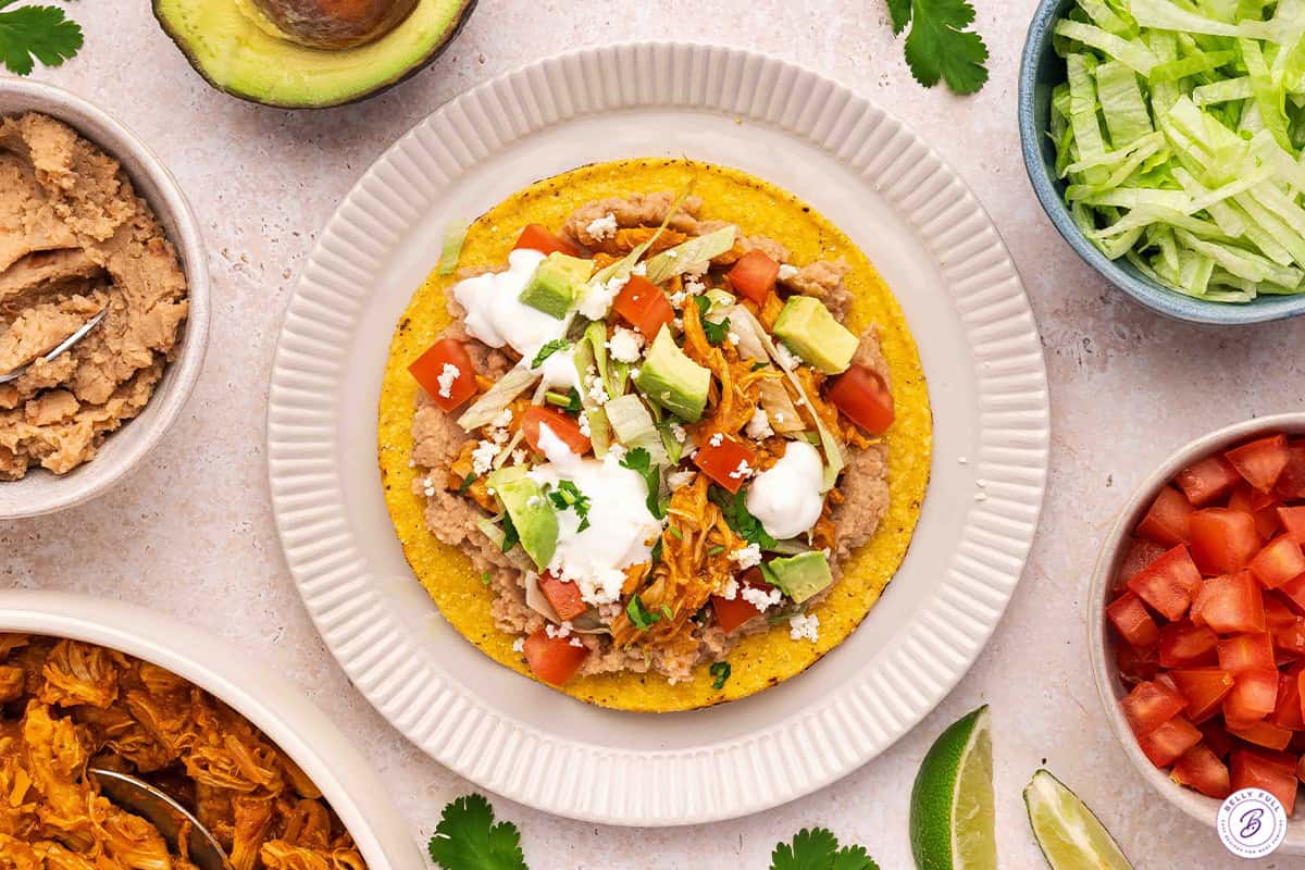 Overhead view of a chicken tinga tostada.