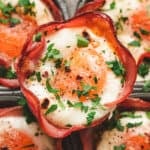 Overhead close up view of ham and cheese egg cups.