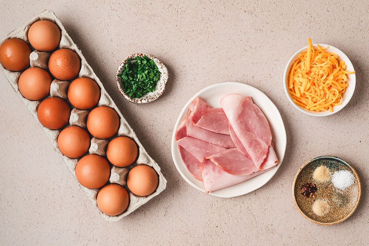 The ingredients to make ham and cheese egg cups.