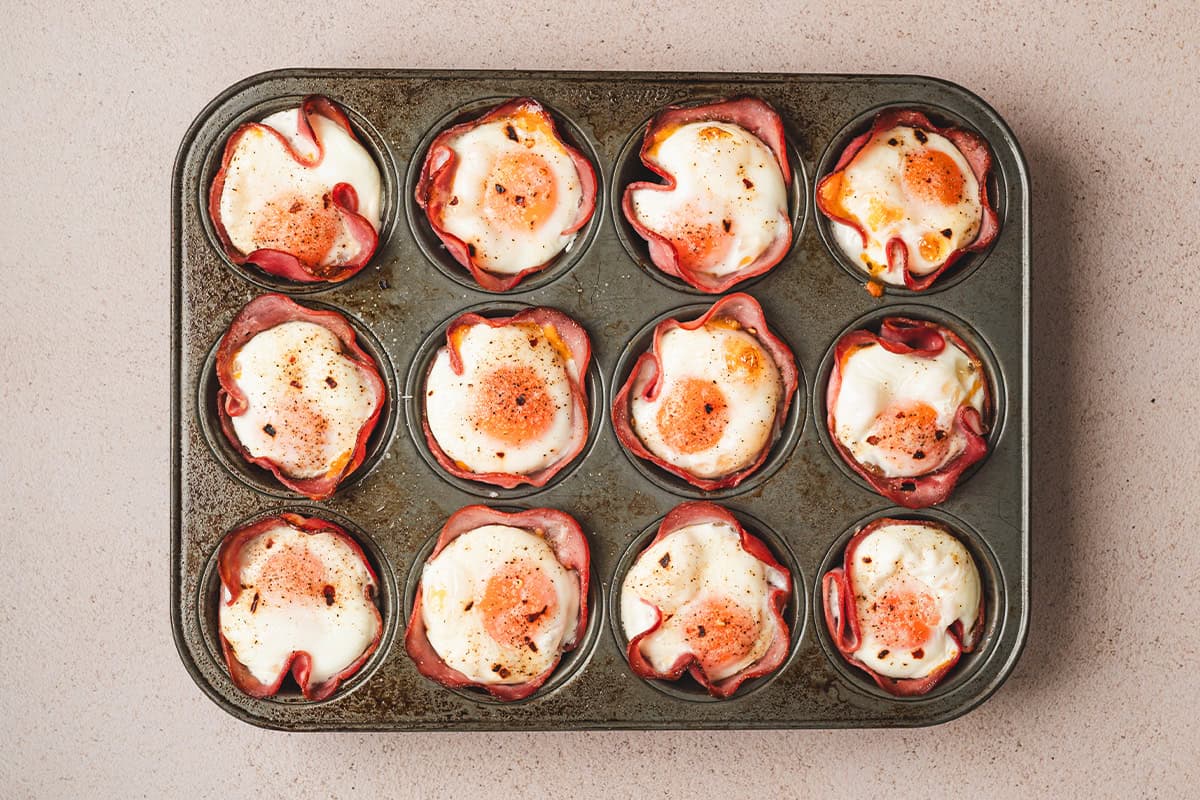 Ham and cheese egg cups after baking.