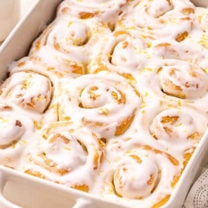 Front view of a dish of homemade lemon sweet rolls.