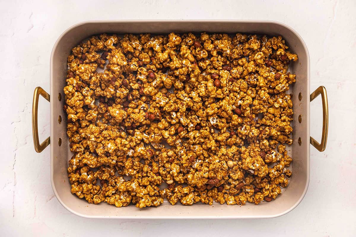 A baking sheet of homemade Cracker Jack.