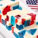 Side view of slices of red white and blue jello.