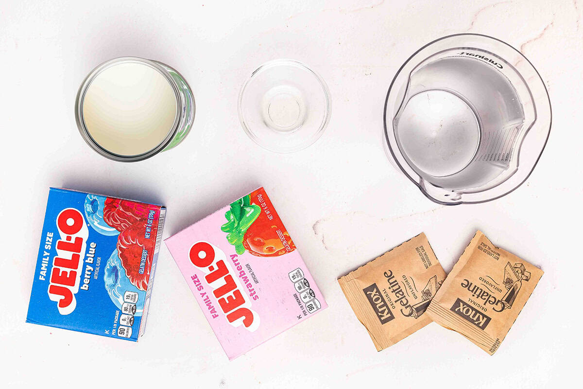 The ingredients to make red blue and white jello.