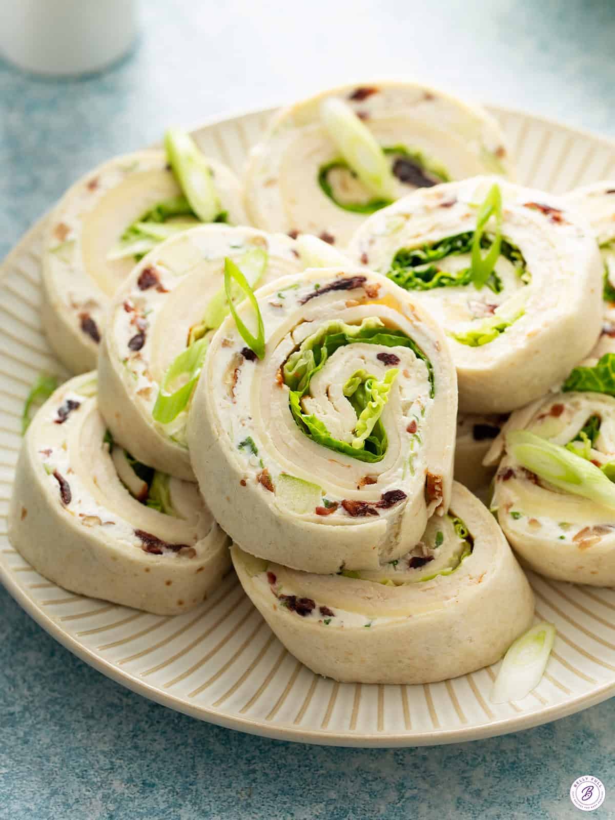 chicken salad pinwheels on serving plate