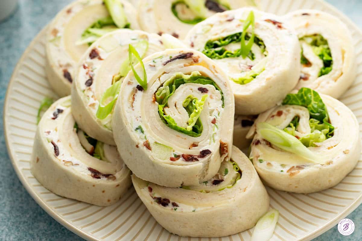 chicken salad pinwheels on serving plate