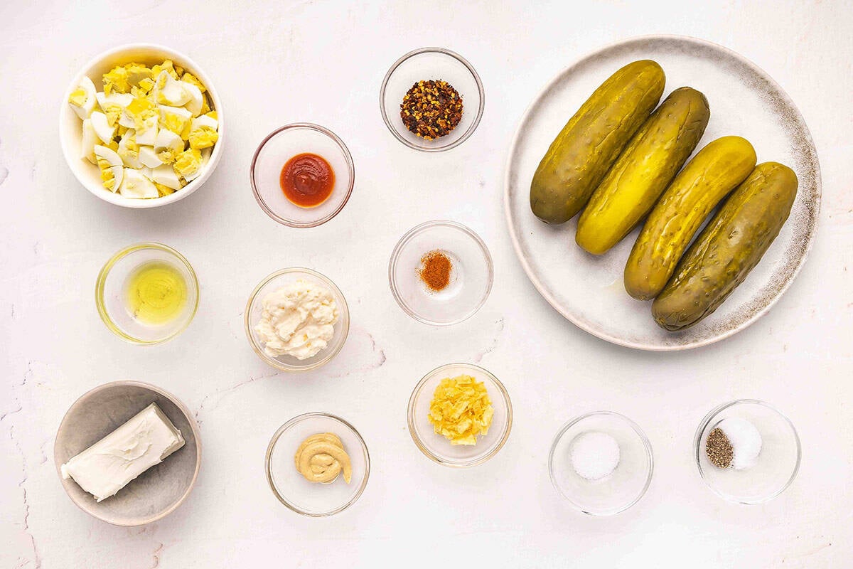The ingredients to make deviled pickles.