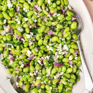 Overhead view of an edamame salad on a platter.
