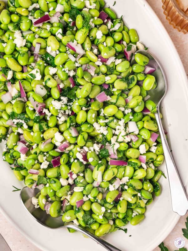 Overhead view of an edamame salad on a platter.