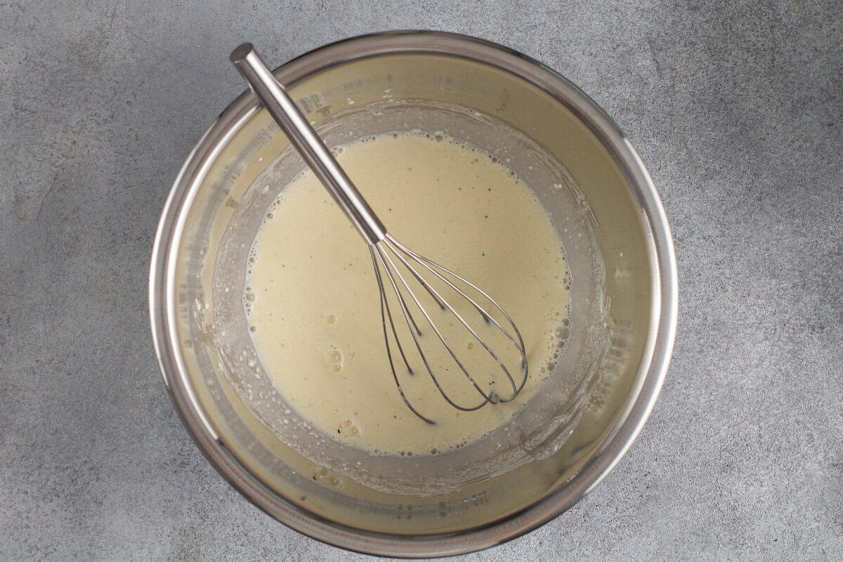 whisked KFC coleslaw dressing in a stainless steel bowl
