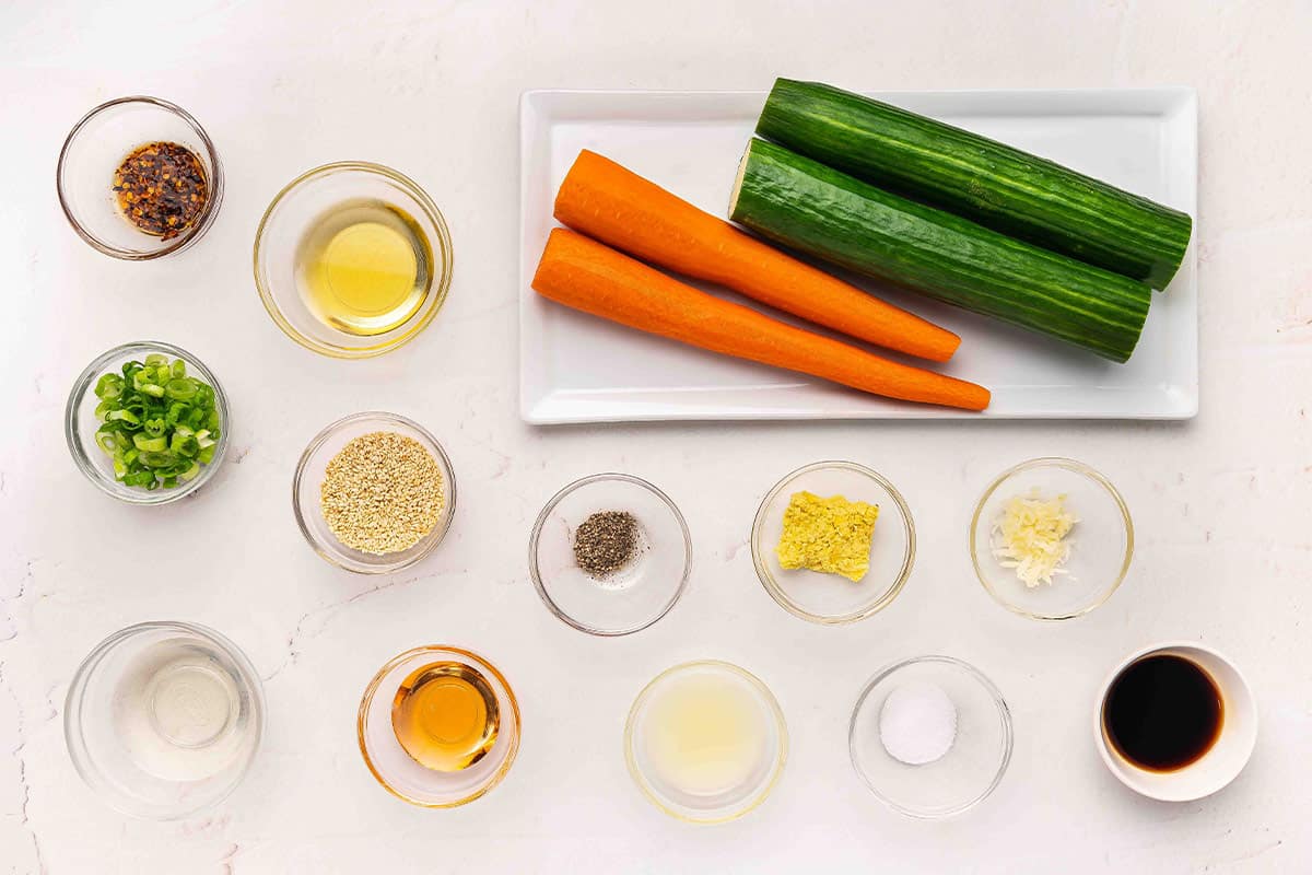 The ingredients to make a shaved carrot salad.
