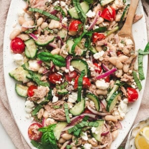 Overhead view of white bean tuna salad on a platter.