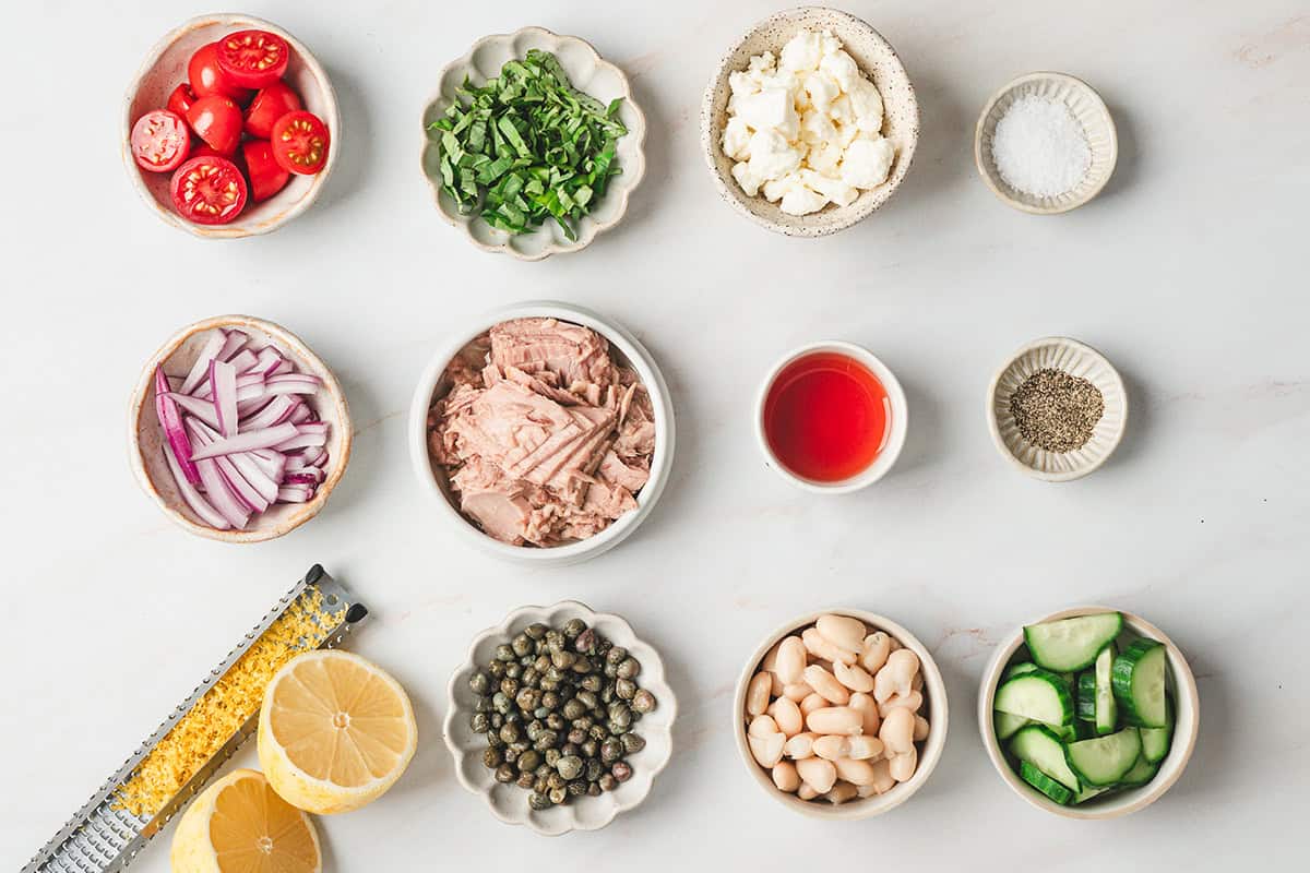 The ingredients to make tuna white bean salad.
