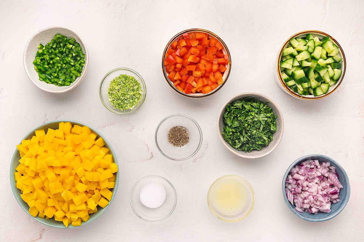 The ingredients to make mango salsa.