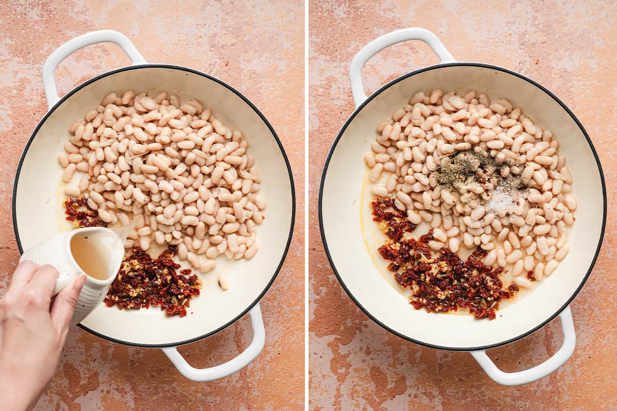 White beans in a skillet with sauteed sun dried tomatoes and minced garlic with broth being poured in, followed by seasonings added to the skillet with the other ingredients added.