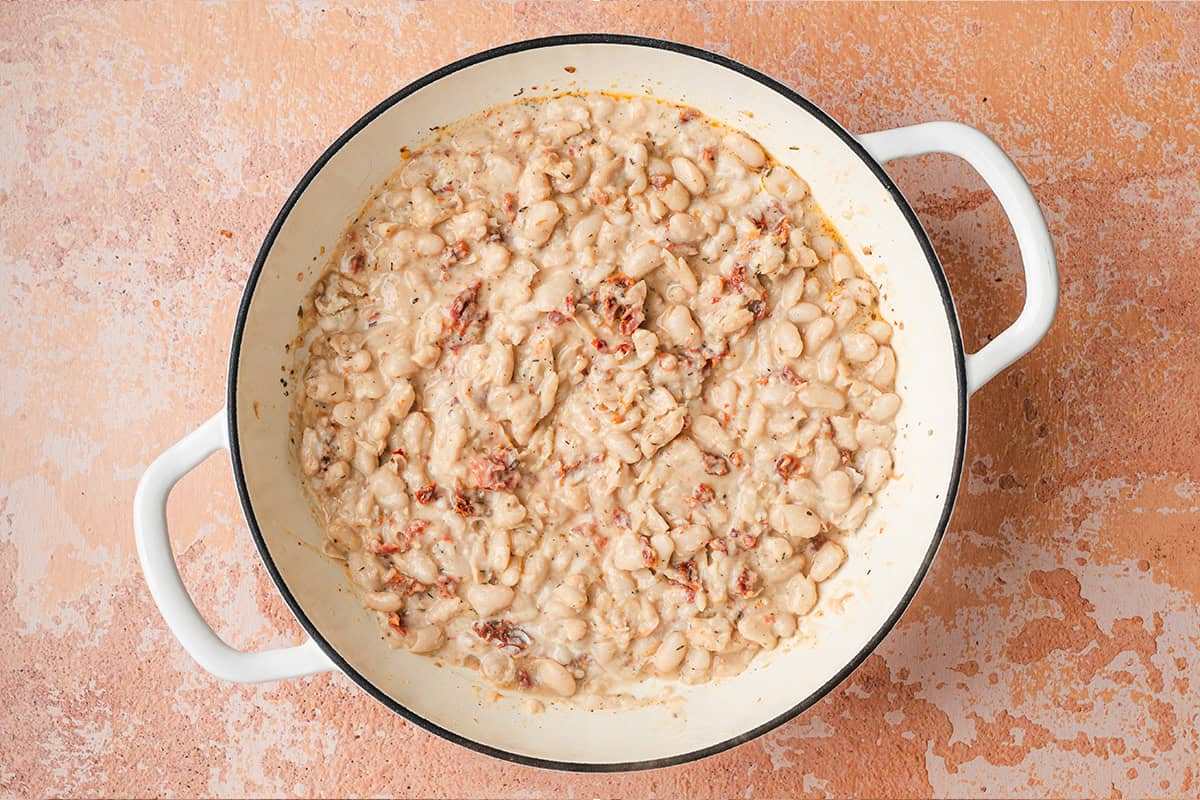 A finished skillet of Marry me white beans.