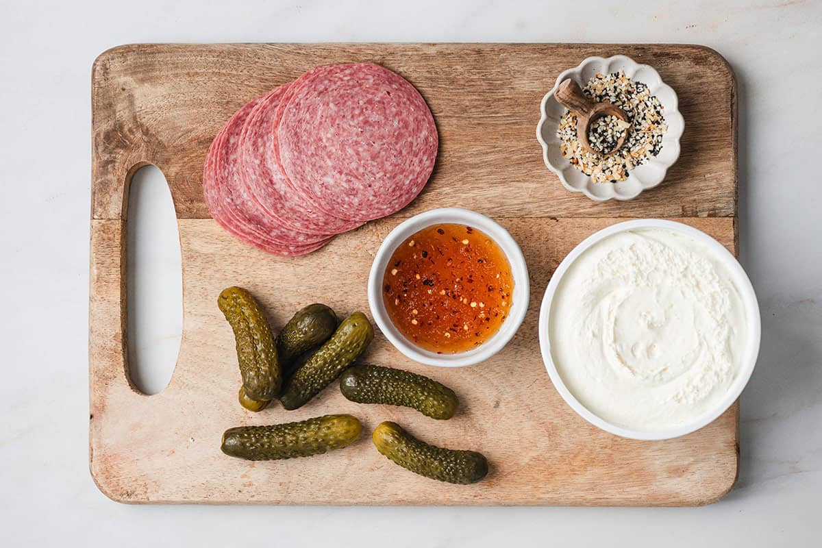 The ingredients to make mini pickle salami tacos.
