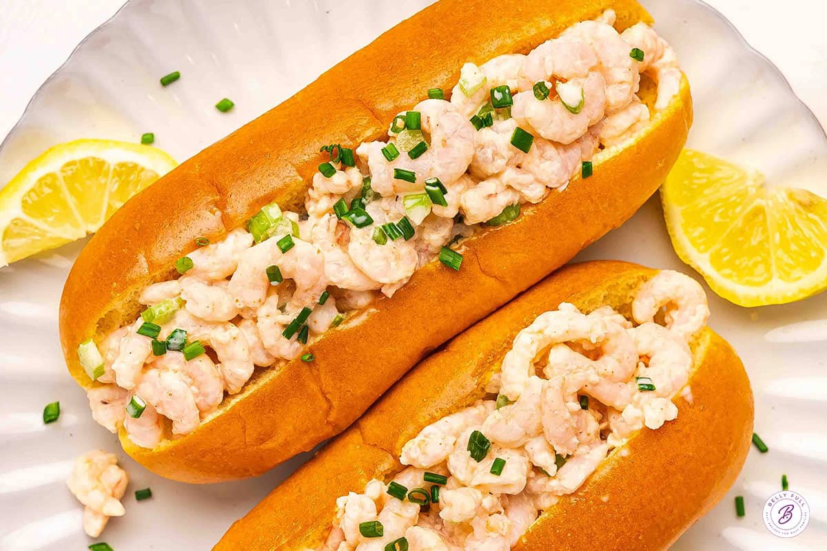 Overhead view of two shrimp rolls.